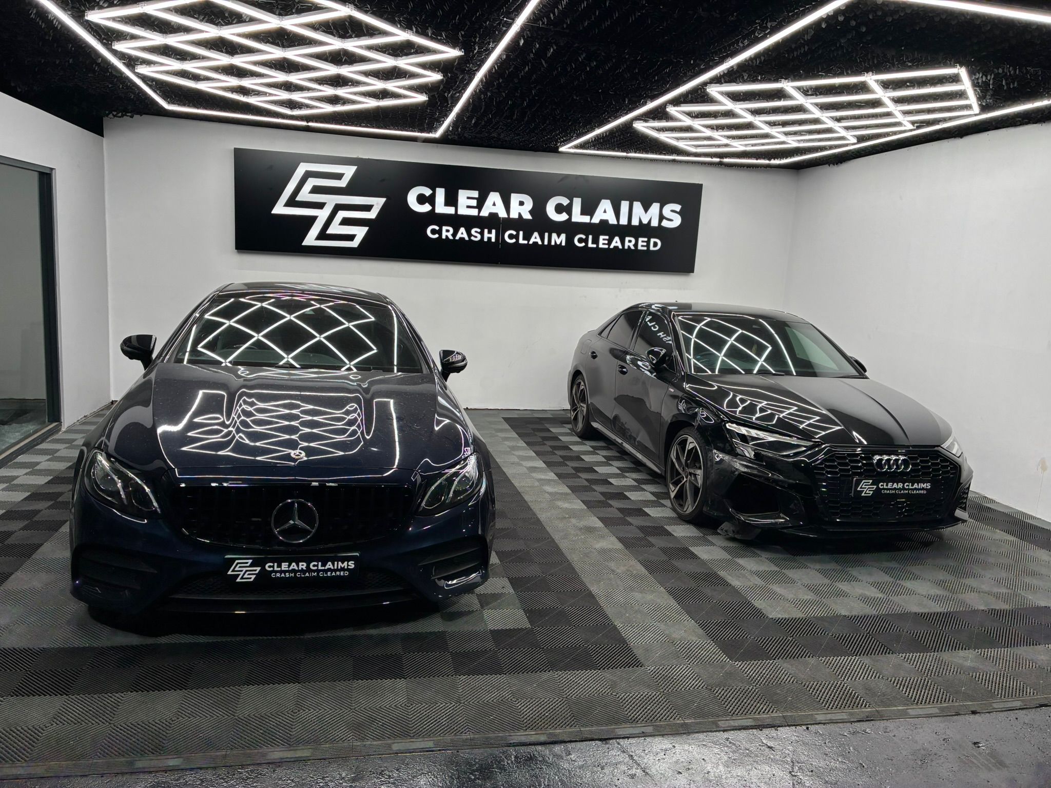 Mercedes E-Class and Audi A5 in Clear Claims studio